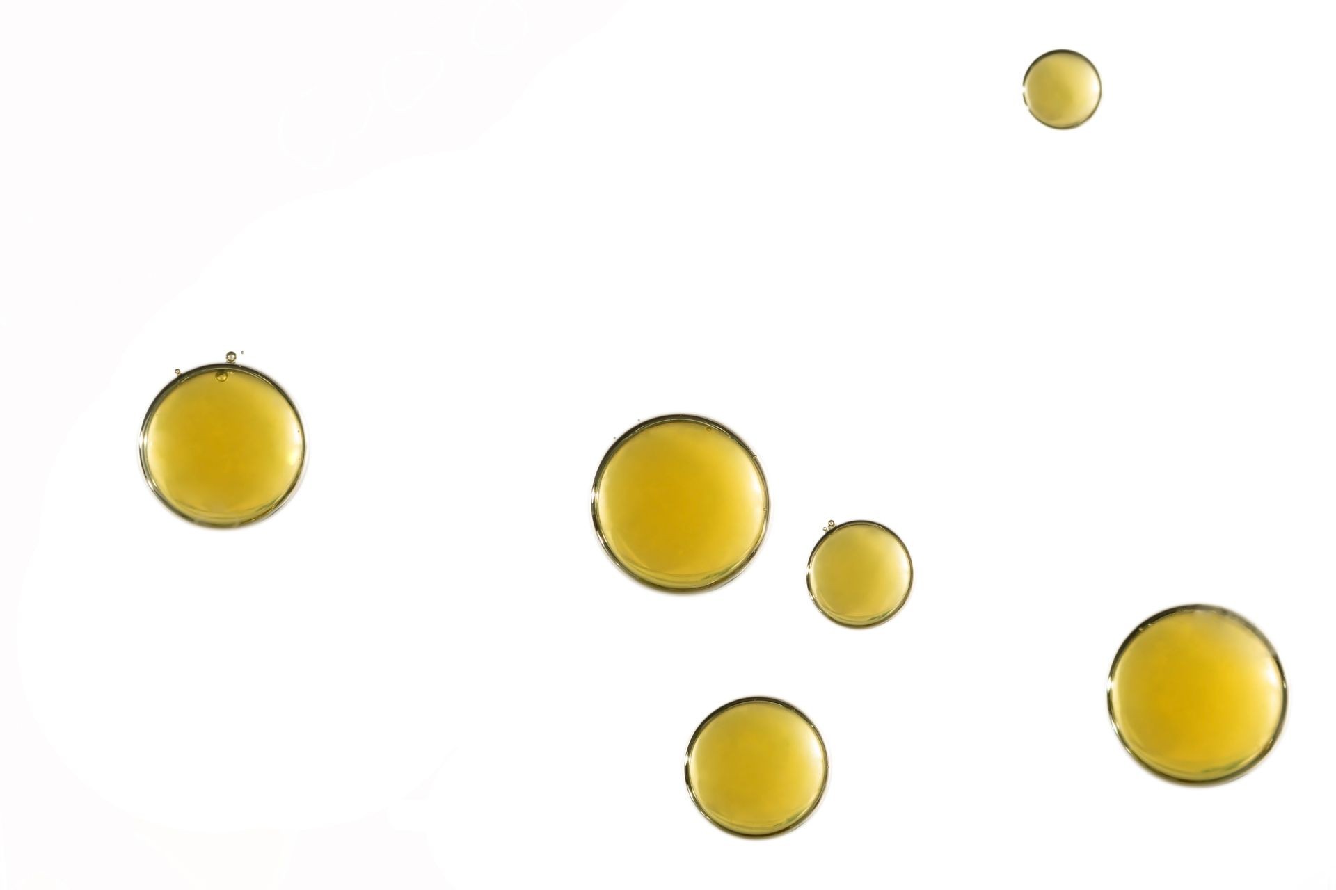 Yellow air bubbles is isolated over a white background.